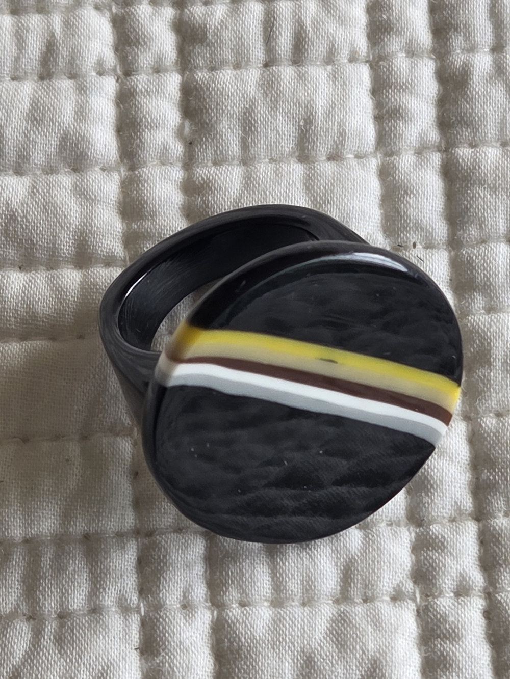 Black Resin Ring with Yellow, Brown and White Accent Stripe